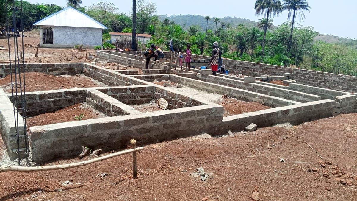 Diverse group of people working together on a mission project